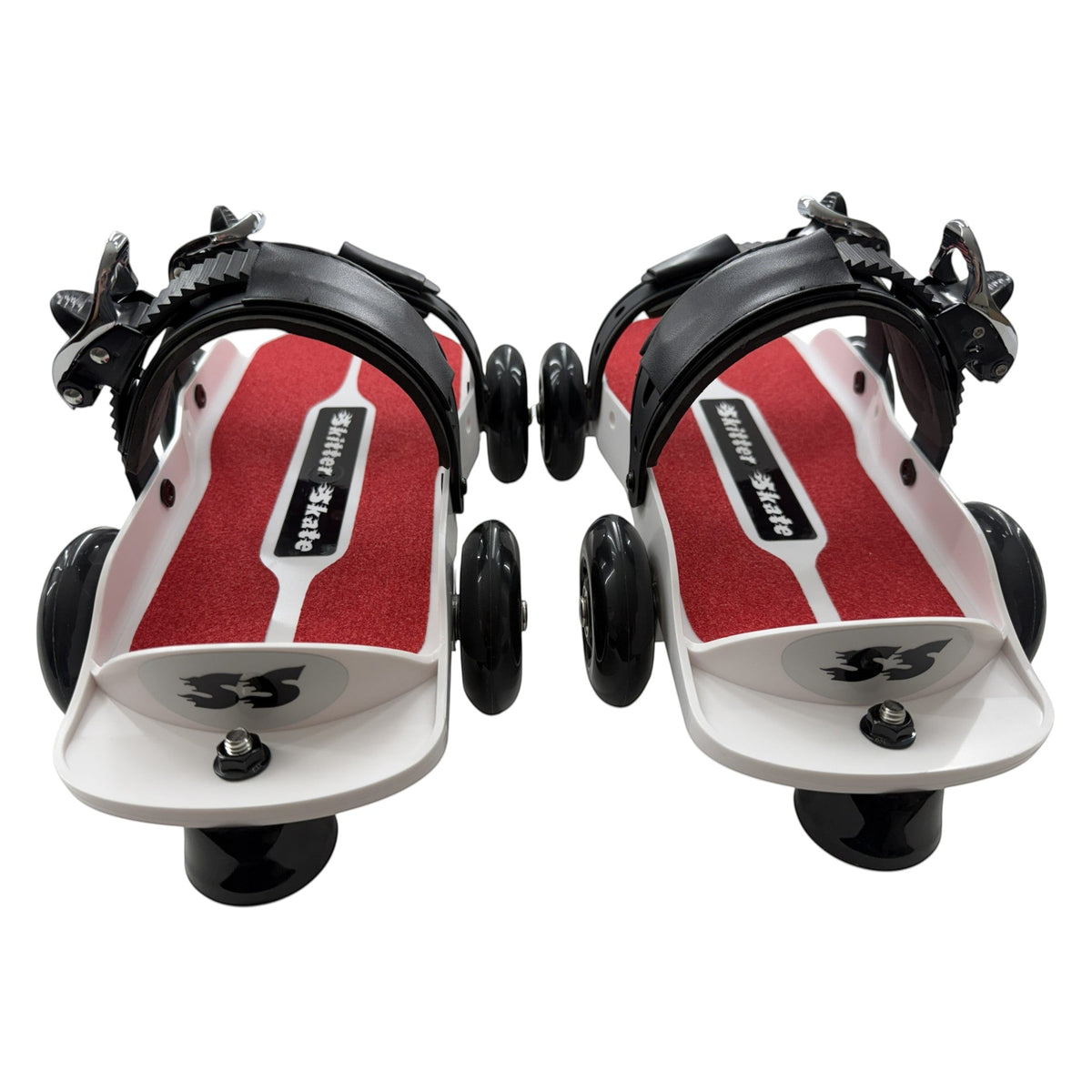 Skitter Skates Red Skitter Skate featuring a white frame, red grip deck, and black adjustable straps on a white surface