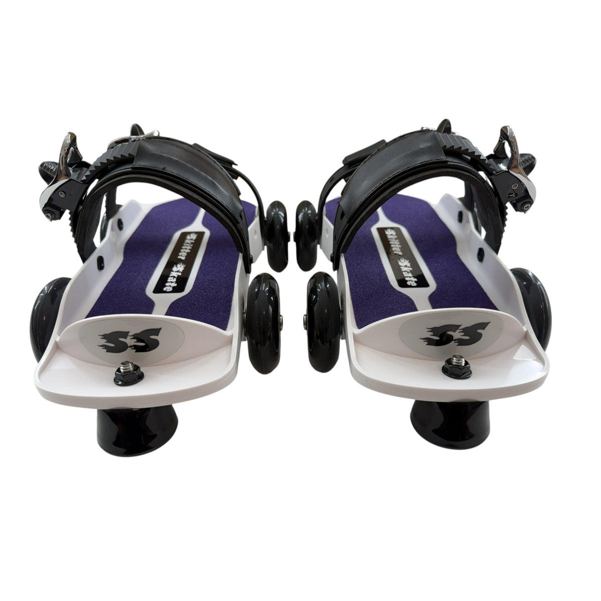 Skitter Skates Purple Skitter Skate featuring a white frame, black straps, and smooth wheels for recreational skating.
